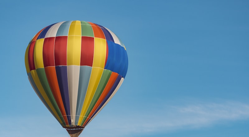 A hot-air balloon over the Hunter Valley at dawn